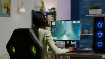 Professional eSport gamer putting headset before playing in competitive games on cyber gaming tournament. Virtual championship in cyberspace, esports player performing on RGB powerful computer photo