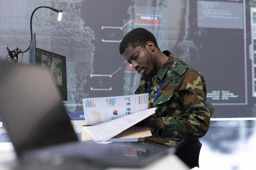 Military team manages cybersecurity operations in a high tech control center base of operations, ensuring data protection and managing surveillance systems, safeguarding national security. photo