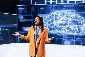 AI expert showcasing cutting edge technologies, sharing industry knowledge. Speaker talks at event gathering industry specialists coming together to discuss latest developments in AI and Big Data photo