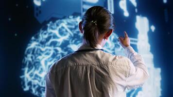 Skillful computer operator developing artificial intelligence neural networks architecture inspired by human brain. Proficient It consultant setting up AI machine learning algorithms i photo