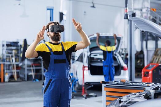 Mechanic in car service uses virtual reality to visualize automobile tires in order to fix them. Garage expert wearing high tech futuristic vr headset while refurbishing unfunctional vehicle photo