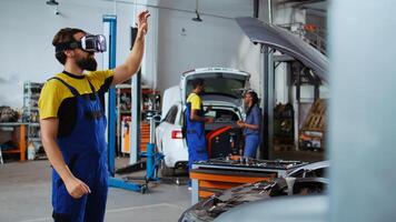 Qualified mechanic in auto garage using augmented reality hologram to visualize car components to woman. Repairman using AR holographic technology to show customer vehicle malfunctions photo