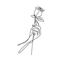 continuous mono line drawing of hand holding a flower vector