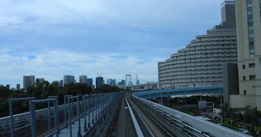 A back point of view on the railway at Yurikamome line in Tokyo video