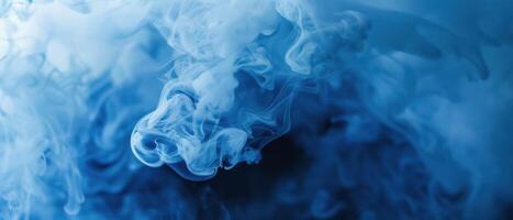 White Ink Swirls in Blue Liquid photo