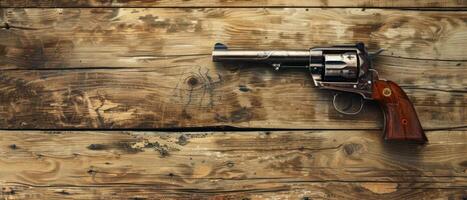 Old Western Revolver on Wooden Background photo