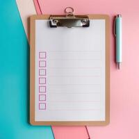 a tablet folder with a blank sheet of paper and a pen photo