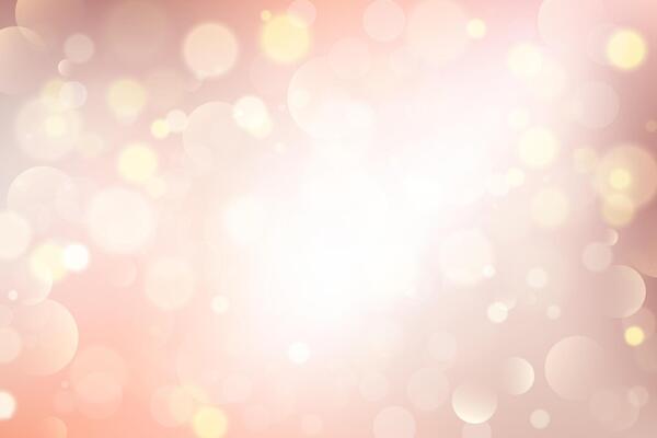 Light background with bokeh. Abstract golden glitter texture. Beige gradient with glow. Ivory pastel blurred backdrop for wedding invitation design. Nude elegant gradation wallpaper