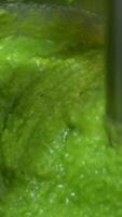 Puree mashed potatoes with green pea in bowl on wooden table plate of soup puree of green peas with mint on a table video
