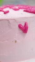 Ganache with Camembert cheese and pears Woman holding raspberry bento cake stuffed with whipped cream. Confectionery, baking and cooking concept woman making cake. process of creating video