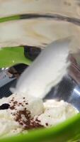 Ganache with Camembert cheese and pears Woman holding raspberry bento cake stuffed with whipped cream. Confectionery, baking and cooking concept woman making cake. process of creating video