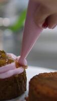 Ganache with Camembert cheese and pears Woman holding raspberry bento cake stuffed with whipped cream. Confectionery, baking and cooking concept woman making cake. process of creating video