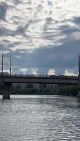 Traveling on a yacht under bridges, sailing, making wishes Ukraine Vinnitsa Southern Bug River. Float along the river view from the river to the city video