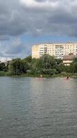Traveling on a yacht under bridges, sailing, making wishes Ukraine Vinnitsa Southern Bug River. Float along the river view from the river to the city video