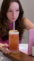 relax on comfortable couch at home texting messaging on tablet, smiling girl use tablet, chatting online message, shopping online from home Girl online tablet. Online study conference video
