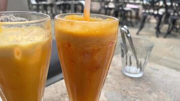 multi-colored ice cream two freshly squeezed juices video
