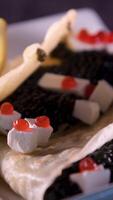 appetizer with caviar Red and black caviar with lemon, feta cheese and lavash video
