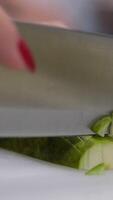 cut a pear Ripe pear cut into different pieces, green pear pieces on the table, cooking dishes video