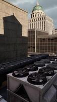 A rooftop with a lot of black donuts on it video