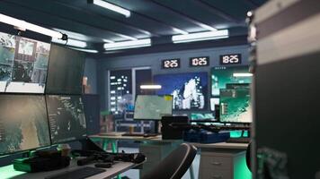 Cutting edge gear in army command center housing operational missile defense system. Armed forces headquarters used for tracking enemy aircraft entering airspace borders using radar systems video