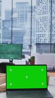 Vertical Interviewers meeting with a job candidate about a vacancy next to green screen, HR team attending interview with applicant during recruitment process. Headhunting concept. Camera B. video