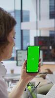 Vertical Recruiters team evaluating applicants resumes next to a green screen, looking at qualifications and work experience. HR experts selecting candidates to fill in a job vacancy at corporation. Camera B. video