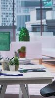 Vertical Empty modern office workspace designed for job interviews to achieve business success, professionals using advanced technology for resumes selection during recruitment process. video
