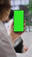Vertical Recruiters team evaluating applicants resumes next to a green screen, looking at qualifications and work experience. HR experts selecting candidates to fill in a job vacancy at corporation. Camera A. video