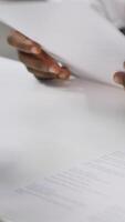 Vertical Wheelchair user job applicant giving his CV to the employers team, participating at interview for vacancy in corporation with inclusion and equality employment policy. Skilled candidate. Camera A. video