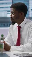 Vertical Two businesswomen engage in a job interview with a new candidate, reviewing the applicant CV and discussing aspects of potential employment and career progression. HR department. Camera A. video