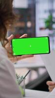 Vertical HR team selecting candidates and using a copy space mockup display in high end office, working on finding the best applicant for the job opening. Recruiters review resumes. Camera A. video