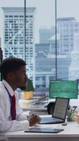 Vertical Recruiter interviewing job applicant to learn about her qualifications and skill, explaining possible career and human resources development plans. Recruitment process for hiring. Camera B. video