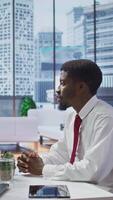 Vertical Two businesswomen engage in a job interview with a new candidate, reviewing the applicant CV and discussing aspects of potential employment and career progression. HR department. Camera B. video
