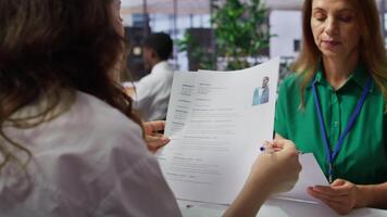 HR employers analyzing candidate CV after the job interview, carefully evaluating all qualifications and business administration knowledge or experience. Selection process for employment. Camera B. video
