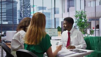 Businessman attending job interview with the HR employees in office, discussing about career plans and the opportunity of human resources development. Recruitment process in enterprise. Camera B. video