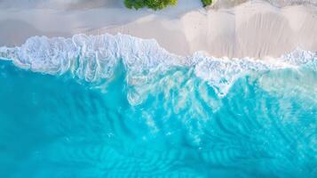 Aerial View of Serene Beach with White Sand Patterns and Turquoise Waters photo