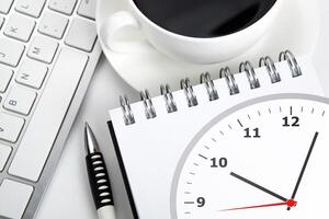 business still life of a notebook and keyboard on the desktop photo