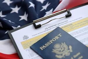 Department of State form DS11 Application for a U.S. Passport lies on table and ready to fill photo