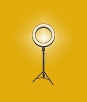 Ring round lamp on tripod vector
