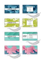 Print a Professional creative business card design template set with a leaf pattern. vector