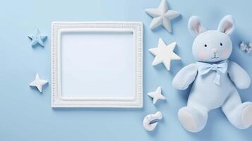 Soft bunny plush with square frame mock up. Charming toy blue. Decorative stars for nursery pictureframe mockup with blank space. Babyhood concept composition top view, border picture photo