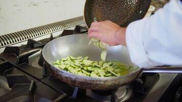 Chef Prepares Fried Zucchinis In A Pan For A First Course In A Restaurant video