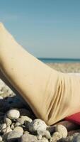 Girl Does Stretching On The Beach With Her Legs video