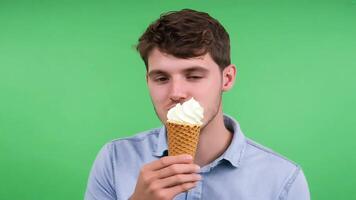 Man Enjoying Vanilla Ice Cream Cone green screen background. video