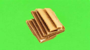Stack of Caramel Toffees on green screen background. video
