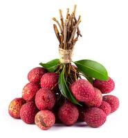 Fresh lychee or litchi is tropical fruit isolated on white background. photo