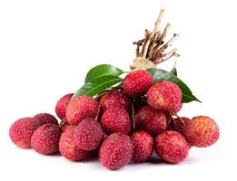 Fresh lychee or litchi is tropical fruit isolated on white background. photo