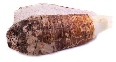 slice of taro root isolated on a white background. photo