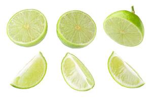 Whole and sliced limes, Sour green fruit isolated on alpha background. photo