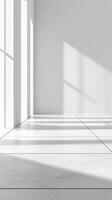 White Room with Windows and Sunlight Casting Shadows on the Floor photo